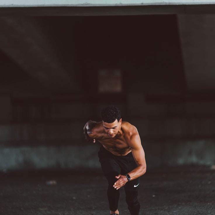 Interior of a professional gym with weight training equipment and mirrors